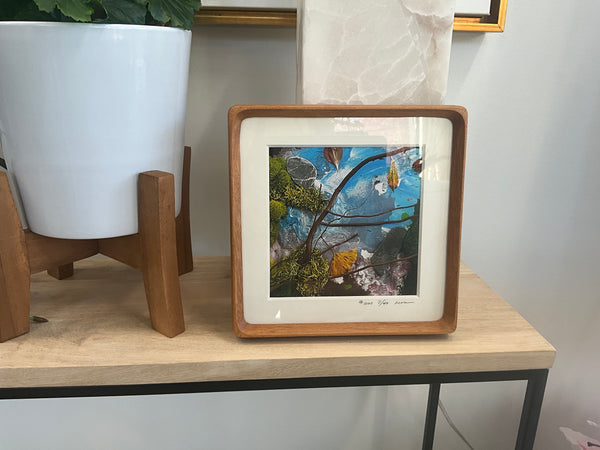 Framed giclee print of natural materials, moss, lichen, gingko, and paint accents 